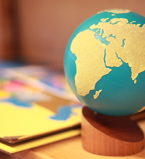 Classic educational Montessori materials in the classroom First globe of land and water.jp