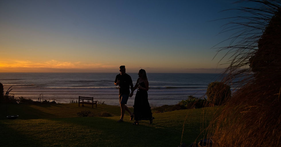 Guests Enjoying a wine at Breakers Boutique Accommodation- West Coast- Greymouth- Coast Road Ocean Views