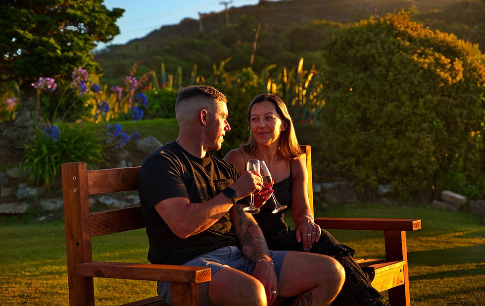 Guests enjoying a New Zealand Wine- Overlooking the Tasman Sea at Breakers Boutique Accommodation-West Coast- New Zealand