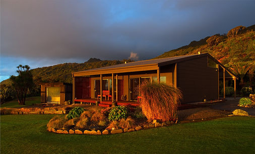 Breakers boutique accommodation annex building under a moody sky on sunset_edited.jpg