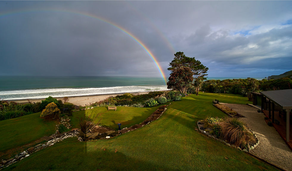 rainbow over the sea from Breakers Boutique accommodation
