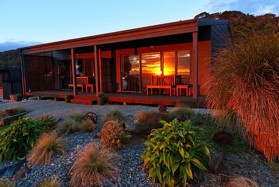 sunset reflections annex room windows breakers boutique accommodation _edited.jpg
