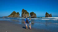 Guests exploring Motukiekie Beach on the West Coast