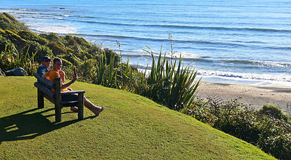 24 Guests enjoying time out and a beer with views to sea from lookout seat