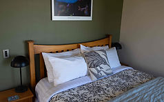 Kowhai Room with private balcony overlooking Nine Mile Beach