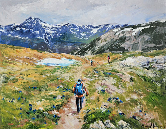Randonneur croisant 2 autres randonneurs sur le sentier du Cirque des Évettes dans la Parc National de la Vanoise en France