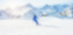 Skiing down the powdery peaks of Aspen, surrounded by breathtaking alpine views.