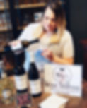 Employee pouring wine