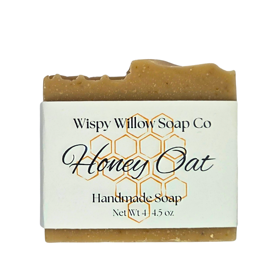 Front label of Honey Oat soap bar with warm golden tones.