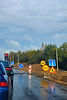 roadwork-area-with-traffic-signs-and-cars-waiting-2026-05-06-02-18-15-utc.jpg