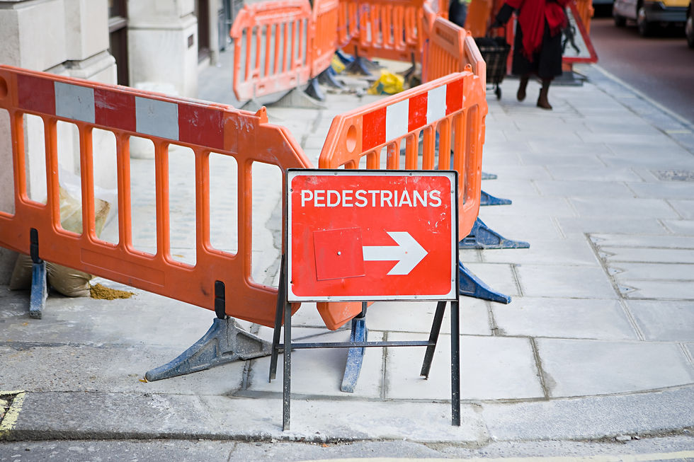 pedestrian-road-construction-sign-in-an-urban-sett-2026-03-25-10-22-57-utc.jpg