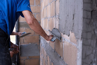 Plastering of plaster workers on the walls for building houses, repairing plaster, indoor 