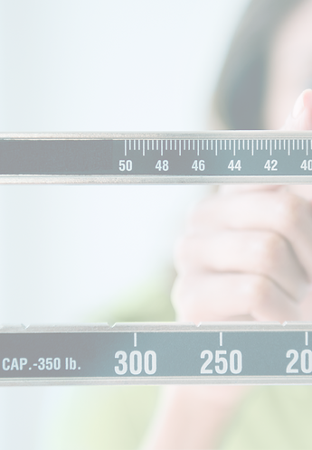 Person adjusting weight scale_edited.png
