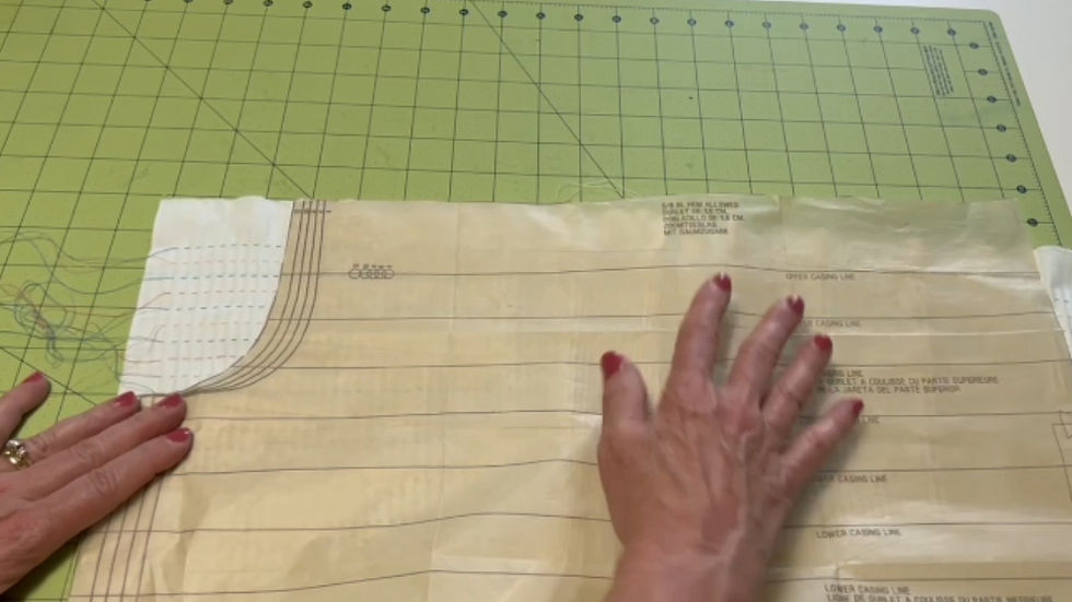 Mark the armhole and remove the pleating threads.