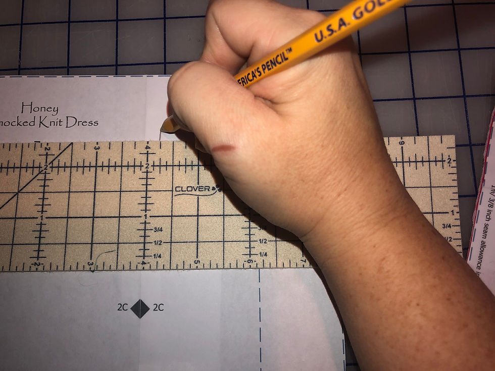 Measure from insert center to edge of smocking.