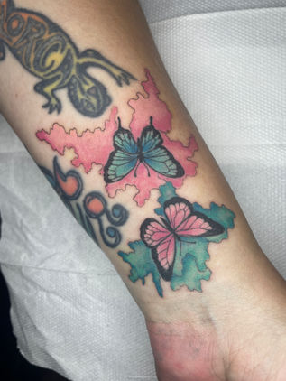 Colour watercolour butterfly tattoo