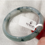Thumbnail: Type A bluish jadeite jade oval bangle 