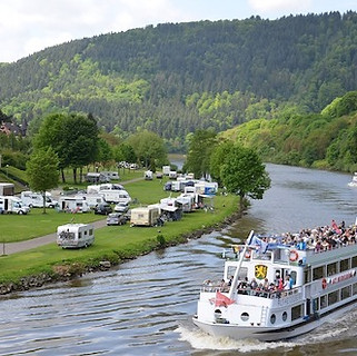 Campsite by a River with a boat