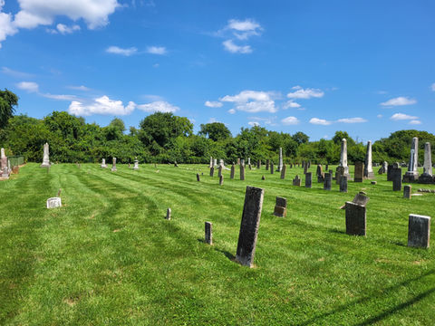 Well-maintained cemetery on sunny day