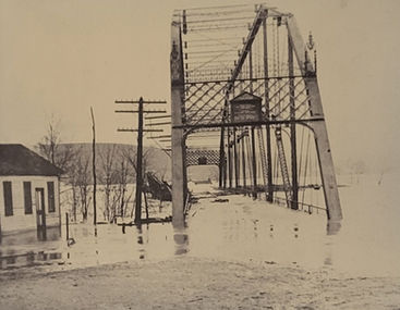 Flooded Whitewater Township bridge, early 1900s