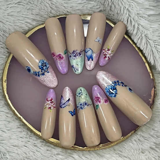 Butterfly floral press-on nails with pastel shimmer