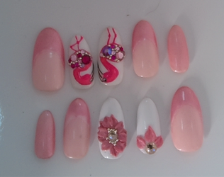Luxury pink flamingo press-on nails with rhinestones, soft ombré finish, and hand-sculpted floral accents.