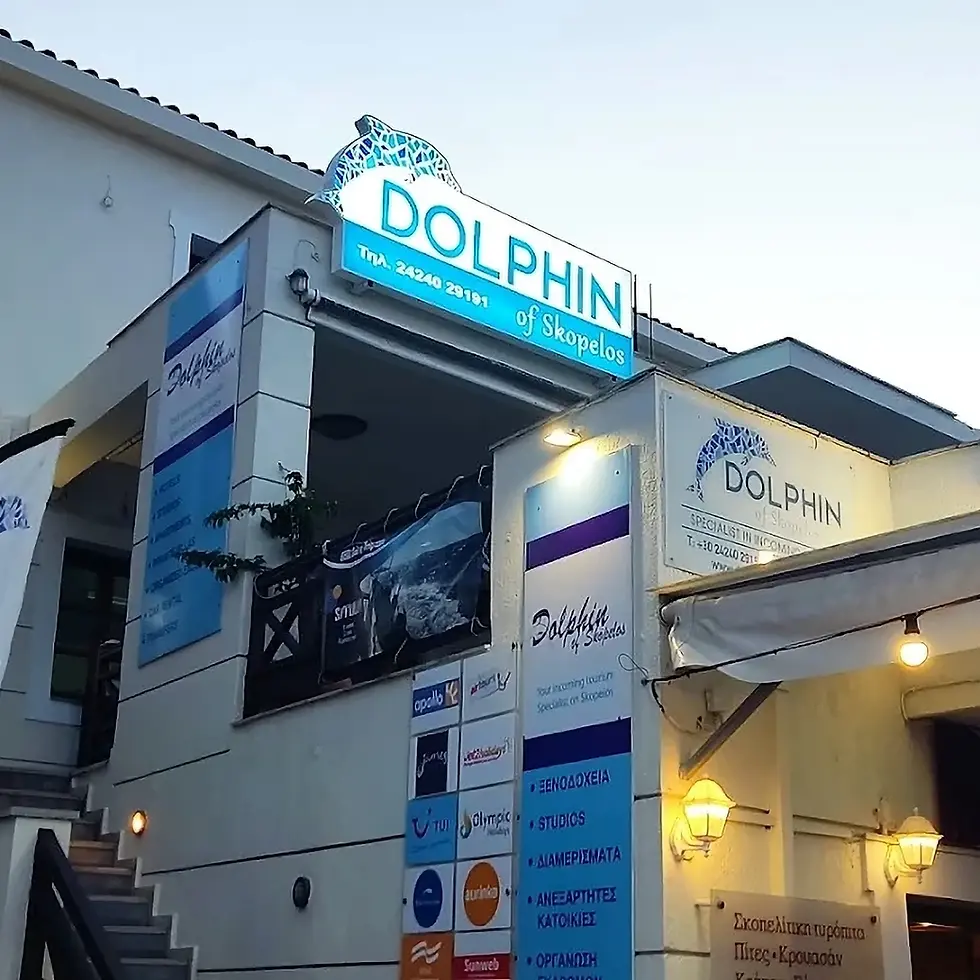 Rent a car storefront with "motor tours" sign, two quad bikes parked, vehicle images on walls, and Europcar branding. Sunny day.