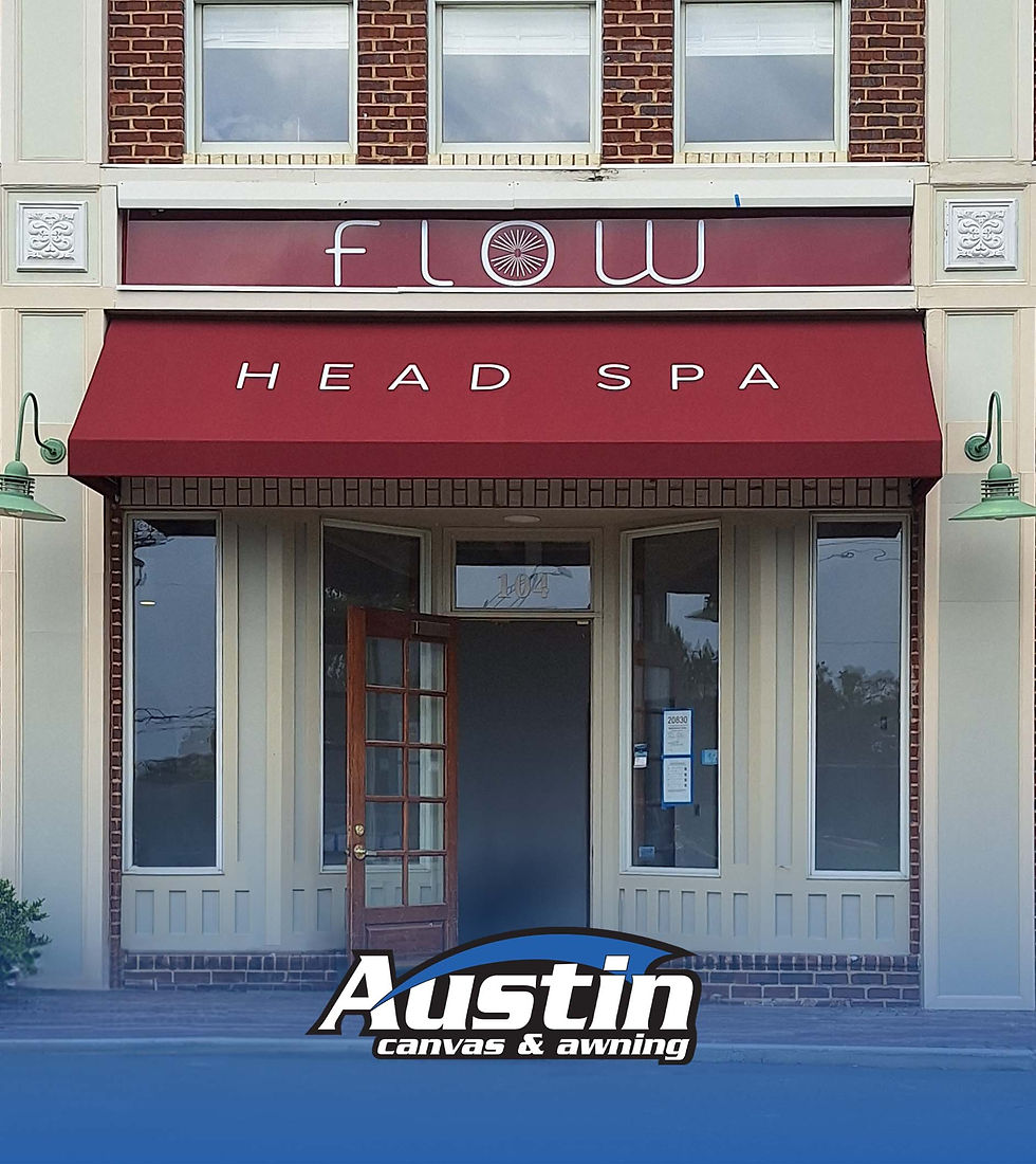 Austin Canvas & Awning created and installed a red awning with custom graphics for Flow Head Spa in Cornelius, NC. Expert awning design and installation in Charlotte, NC, by Austin Canvas & Awning.