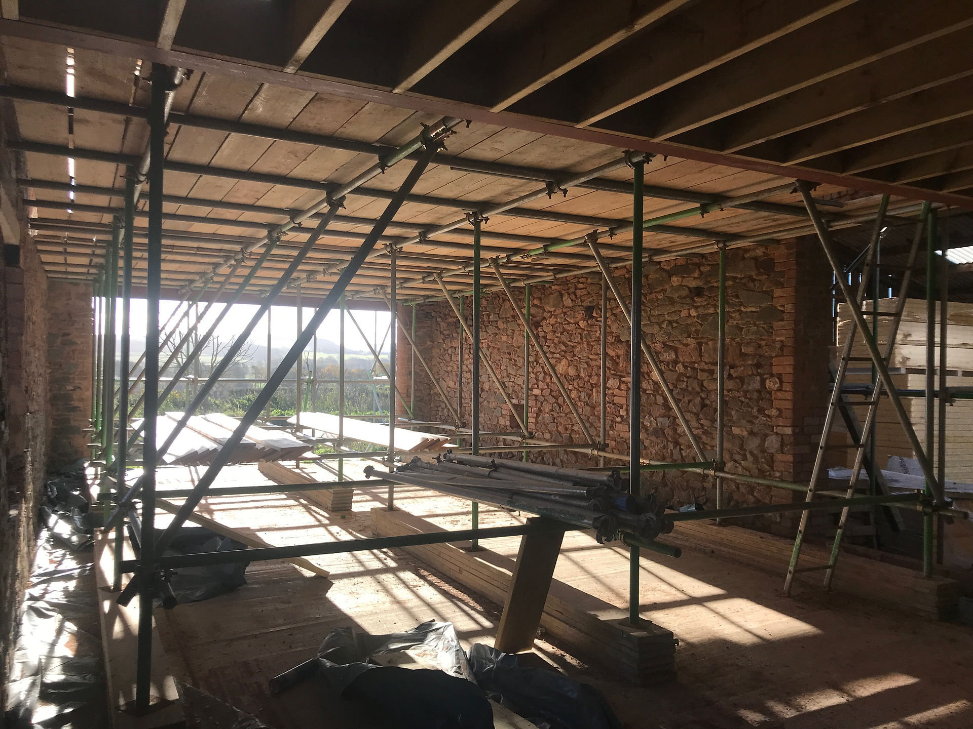 Long barn under the scaffold