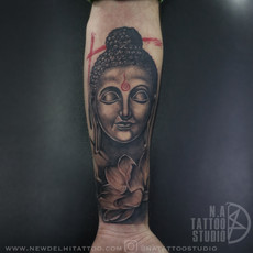 buddha lotus tattoo.jpg