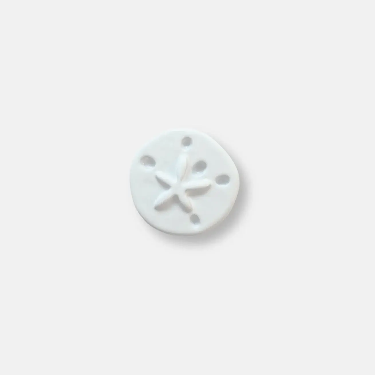 CH0104 - White Sand Dollar Charm