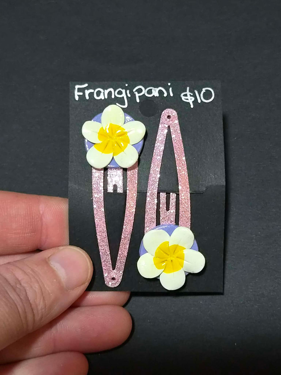 Thumbnail: Frangipani Clips