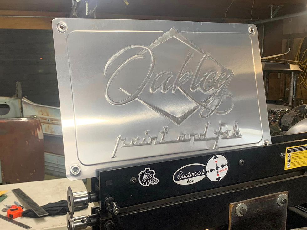 Oakley fab and paint sign