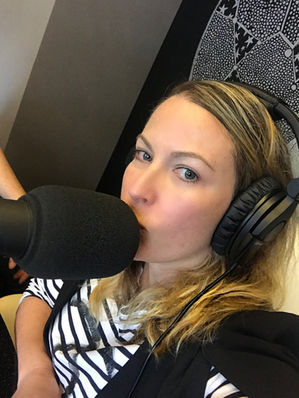 Melinda in the podcast booth for 9Honey