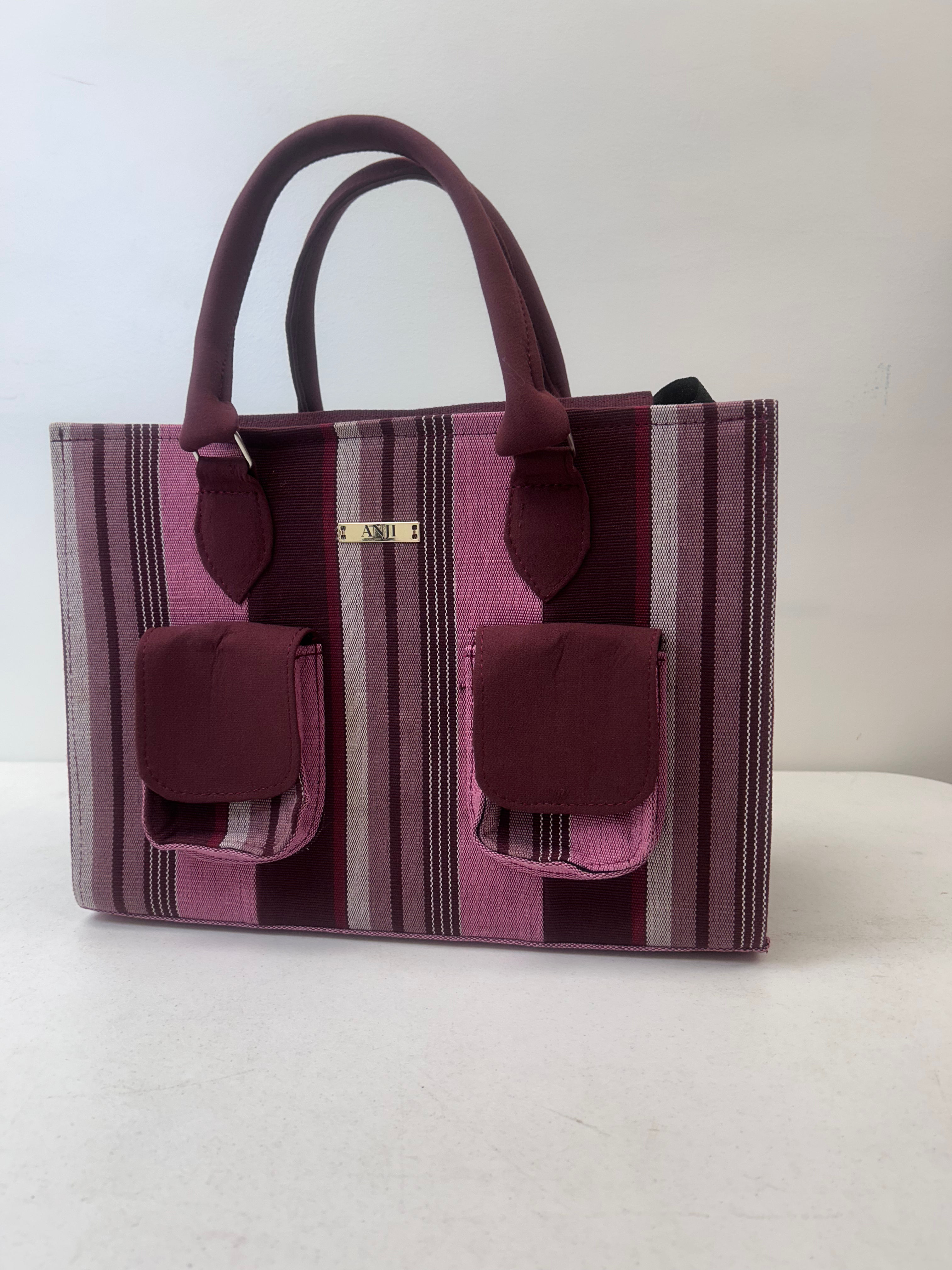 Ìsàlè Èkó Aṣọ òkè Pink Stripe Travel Bag