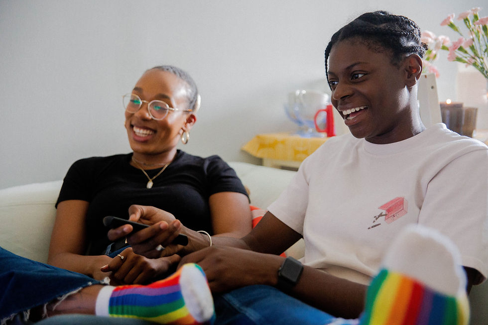 two women on a couch
