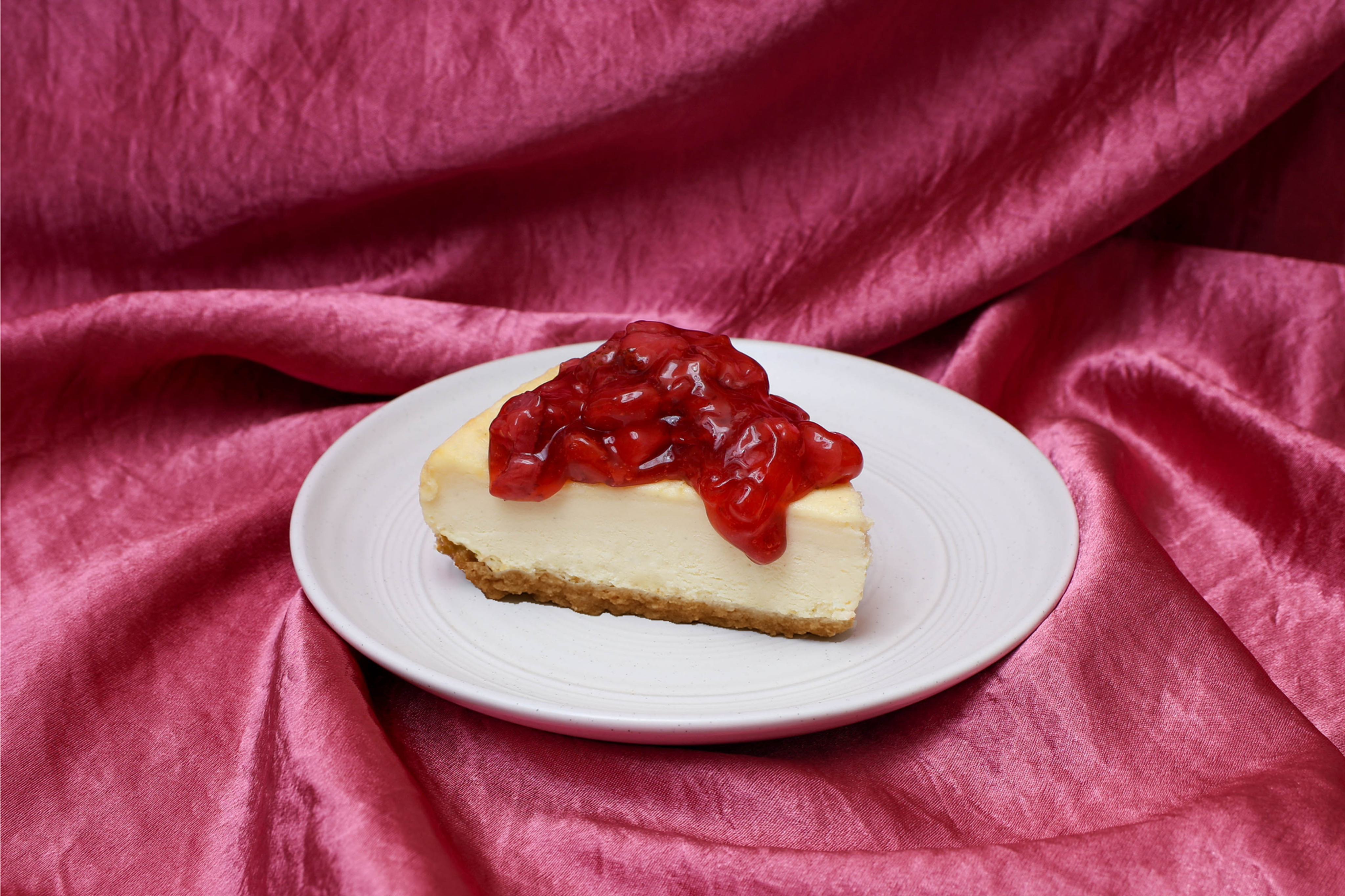 Strawberry Topped Vanilla Bean Cheesecake