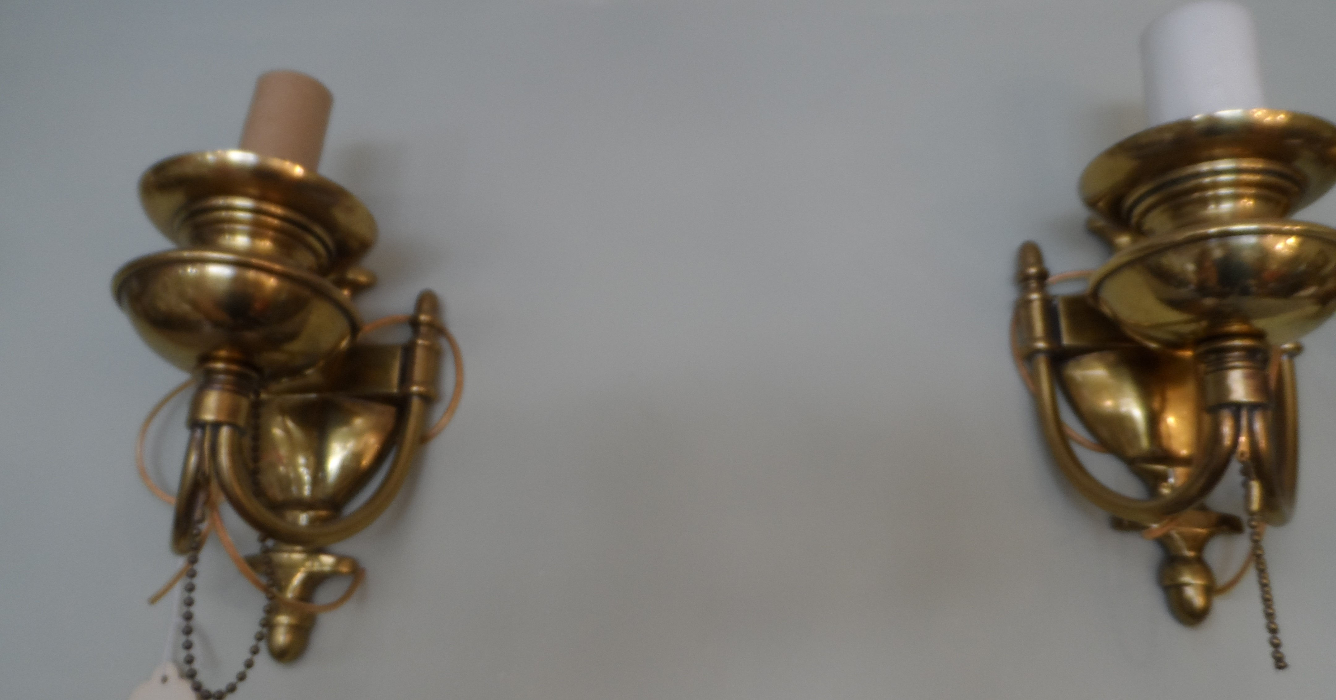 Pair of vintage brass colonial-style wall sconces