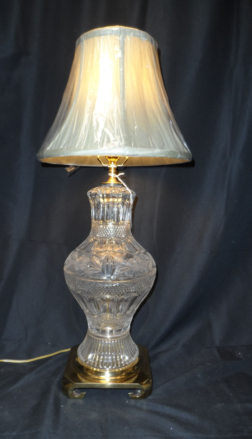 Thumbnail: Vintage cut crystal table lamp with a brass base