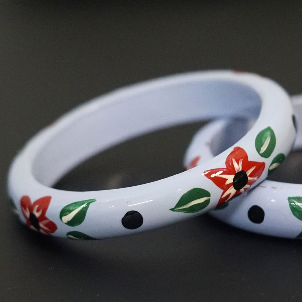 zoom shot of Floral-Themed Mango-Wood Bangles 17