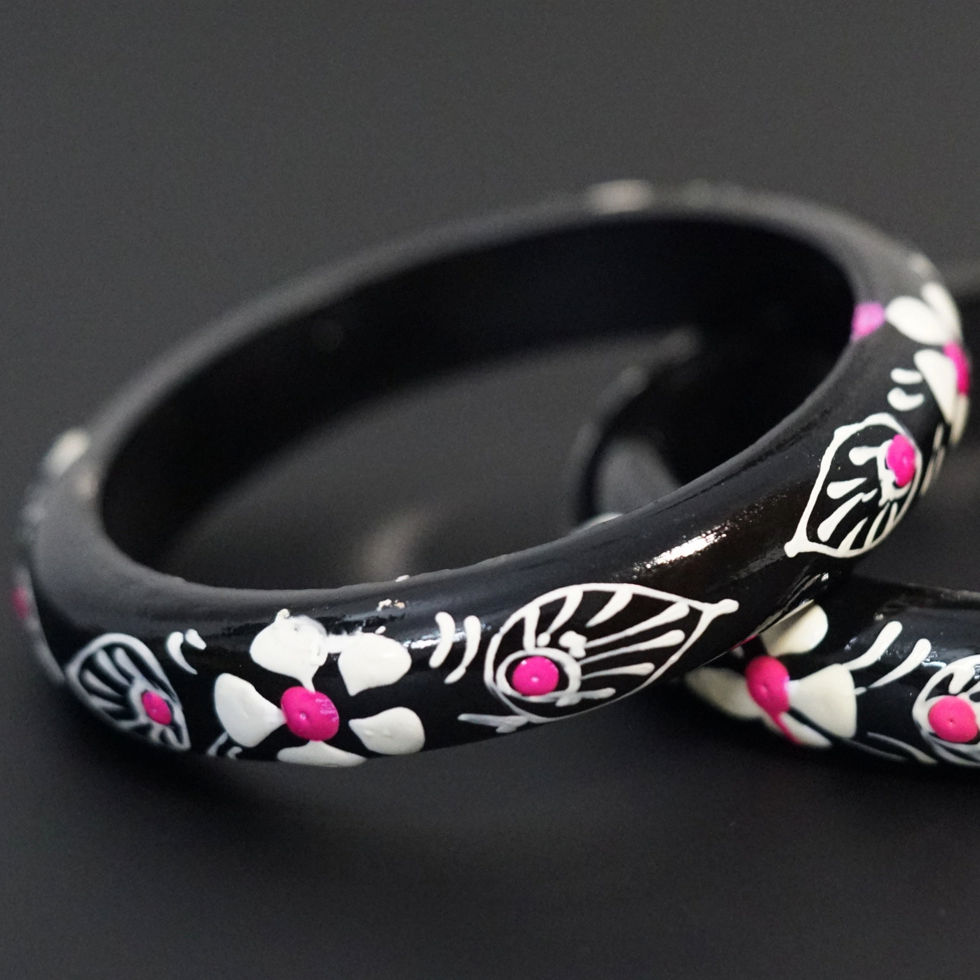 zoom shot of Floral-Themed Mango-Wood Bangles 3