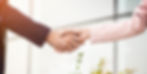Two people shaking hands, business agreement, partnership, success, deal HUMAN LENS MEDIA