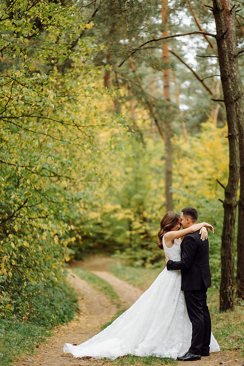 bride-groom-run-through-forest-wedding-photo-shoot.jpeg