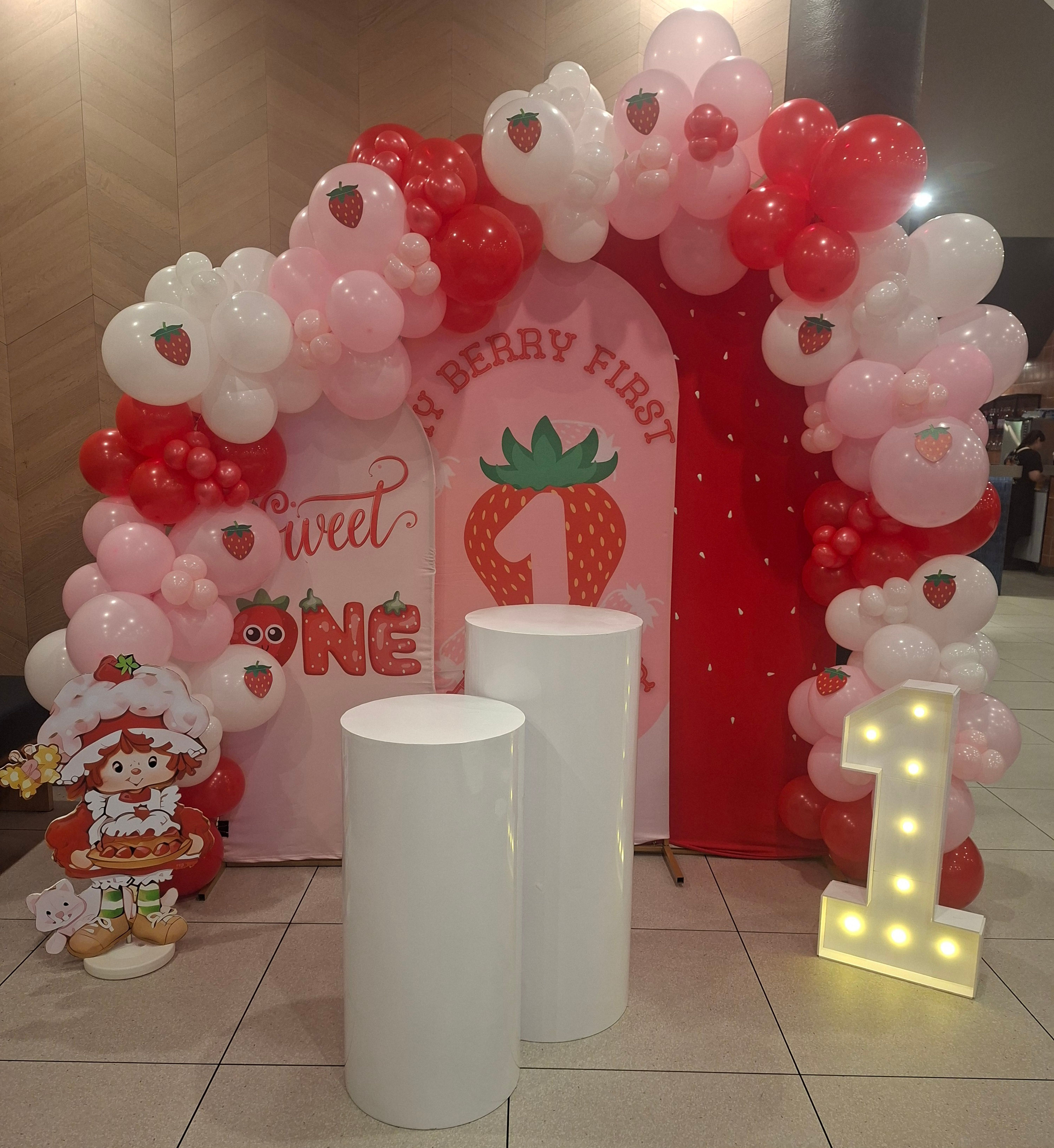 Strawberry Short Cake balloon setup for birthdays