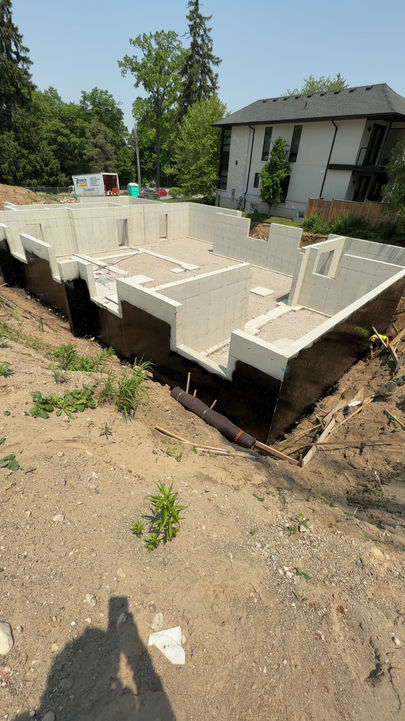 Spray and wrap basement waterproofing