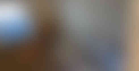 before photo of bathroom with tub and torn out walls