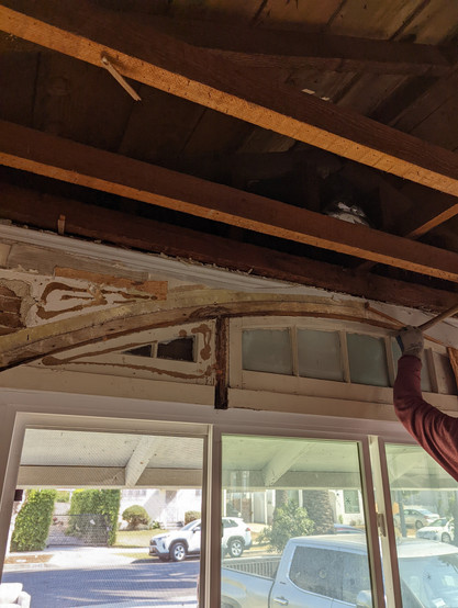 found arched window with original details