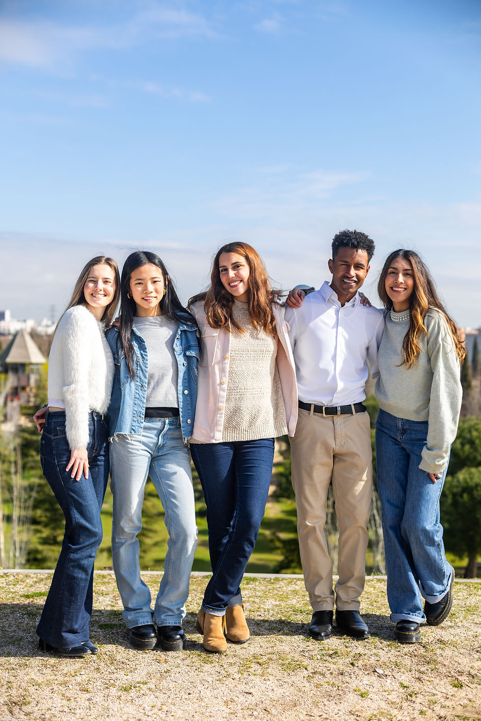five-students-smiling-together-in-a-park-2026-03-19-09-17-24-utc.jpg