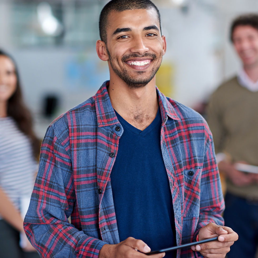 smiling-young-man-holding-tablet-in-modern-office-2026-01-09-09-23-18-utc.jpg