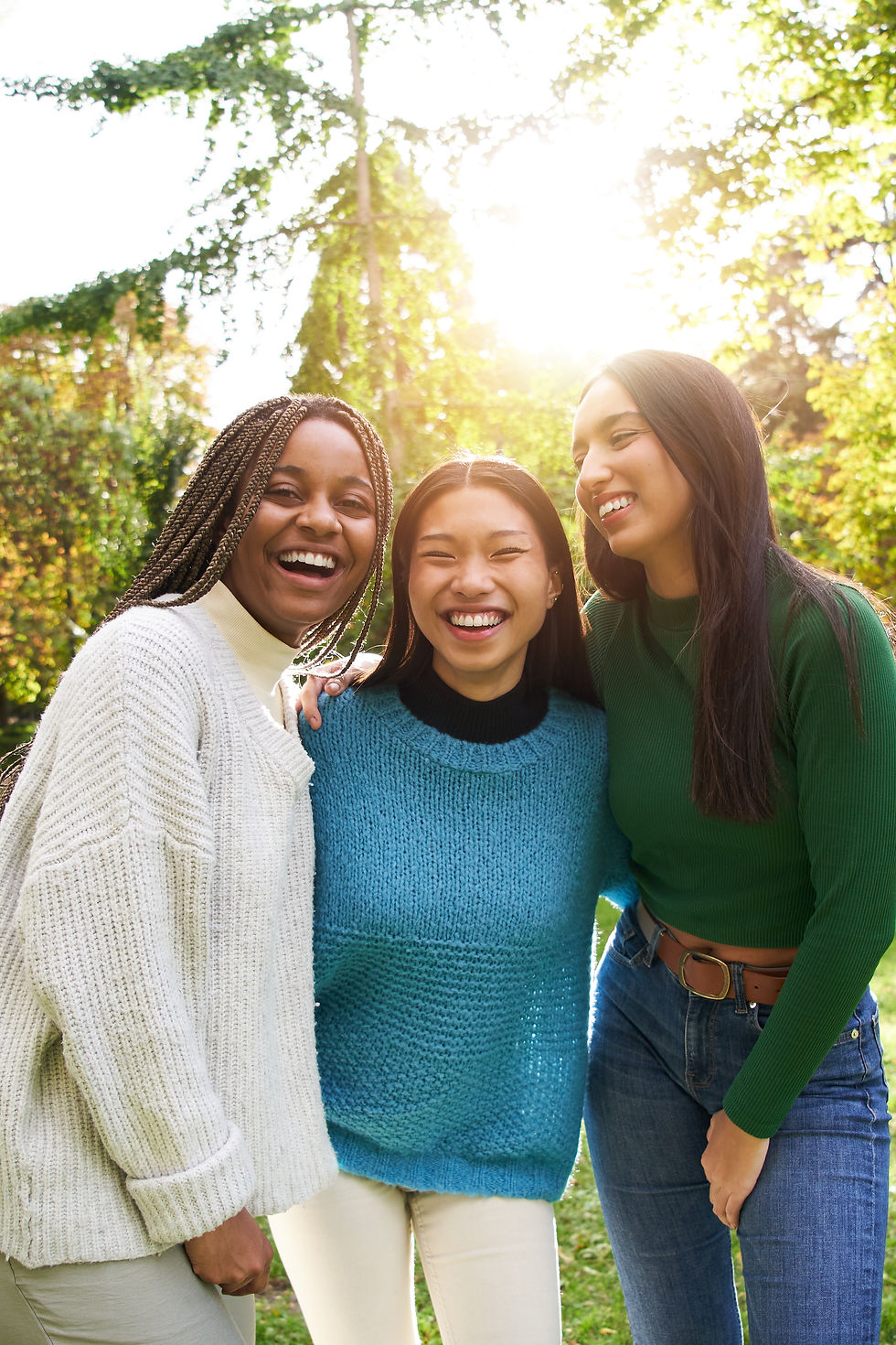 three-smiling-women-enjoying-a-sunny-day-outdoors-2026-01-06-10-10-43-utc.jpg